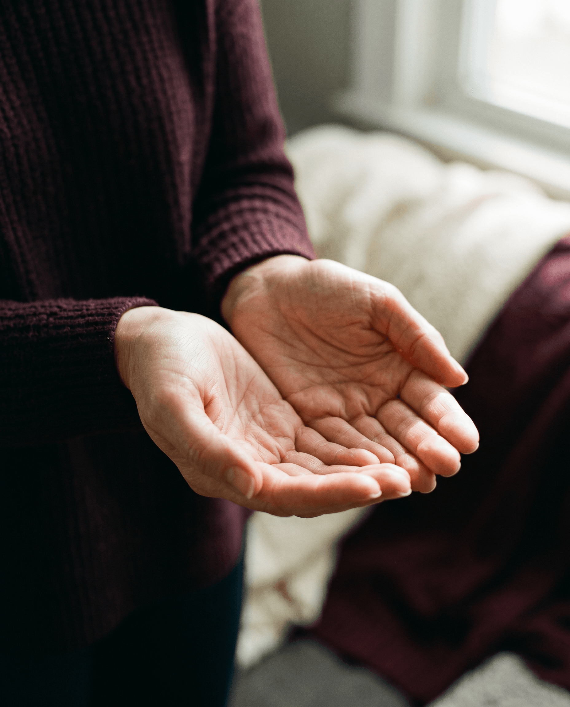 cupped hands · bokeh light